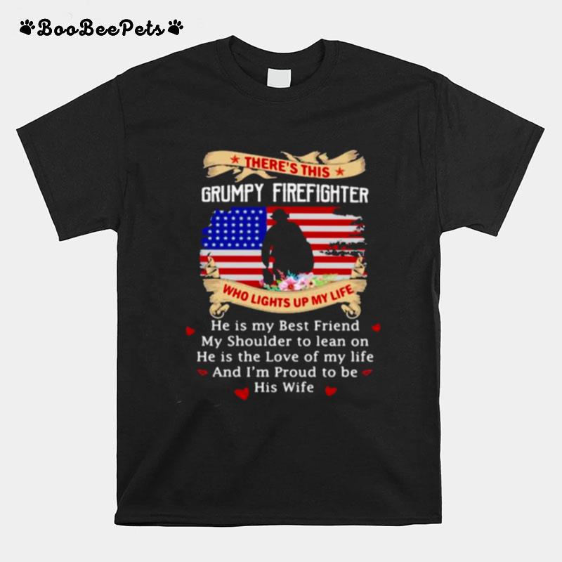 Theres This Grumpy Firefighter Who Lights Up My Life Flower American Flag Veteran T-Shirt